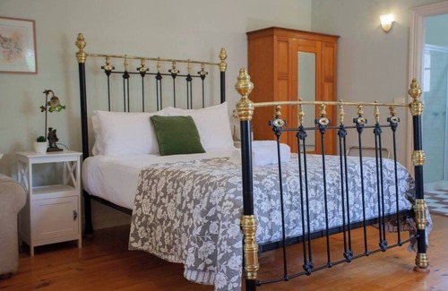 Golden Point Maison | Welcome to Rapunzel's Cottage, a charming 1-bedroom studio with a magical fairytale vibe