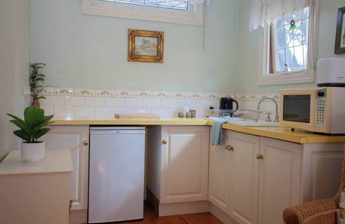 Golden Point Maison | Welcome to Rapunzel's Cottage, a charming 1-bedroom studio with a magical fairytale vibe
