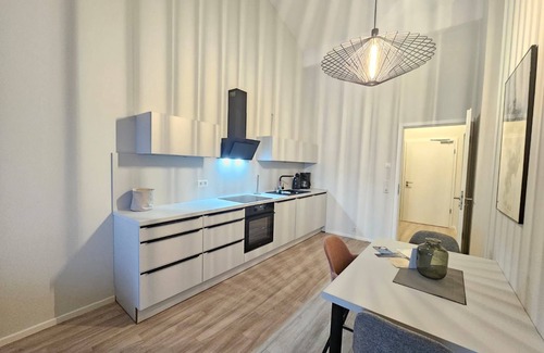 Suderneuland I Appartement | Welcome to the exclusive Teefabrik vacation apartment in the center of Norden