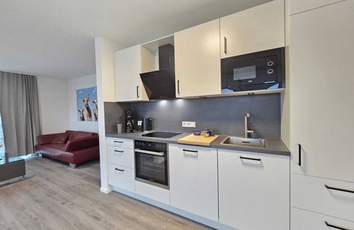 Suderneuland I Appartement | Welcome to the modern NorderHafen vacation apartment with a magnificent view of the