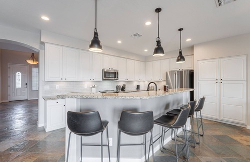 Augusta Ranch Maison | Welcome to The Shandy Landing! This retreat boasts an amazing new outdoor kitchen, 4 luxury King Bed -Bedrooms, gorgeous privacy, pool & hot tub, lawn games and stunning golf course views. Your serene getaway awaits 🌞⛳