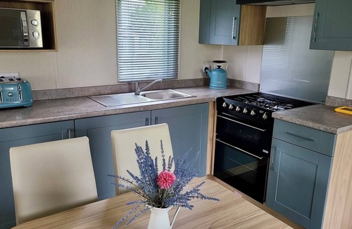 Cross Inn Maison | Welcoming family caravan on large pitch near beautiful New Quay in West Wales