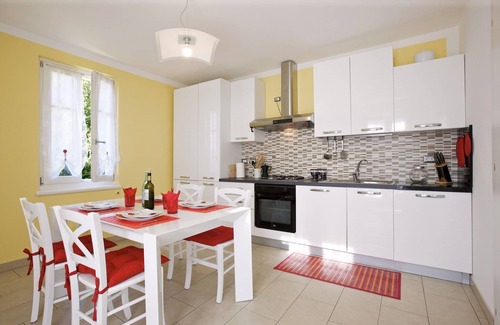 Gonte Appartement | Appartement de 3½ pièces bien entretenu avec jardin, balcon et belle vue sur le lac
