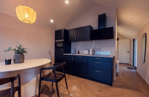 Municipality of Hellendoorn Chalet De Ski | Wellness Lodge with hot tub in the woods on the Sallandse Heuvelrug