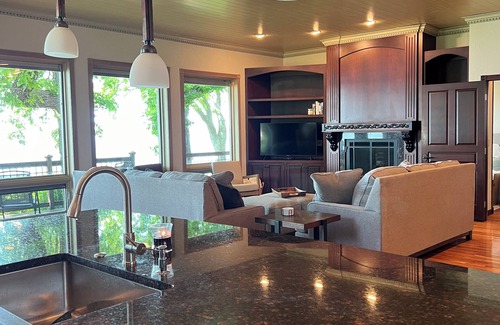 West Okoboji Maison | West Lake Okoboji lakefront cottage with private dock/hoist. Near Arnolds Park!