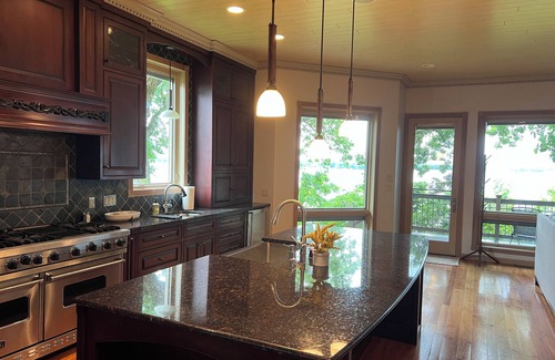 West Okoboji Maison | West Lake Okoboji lakefront cottage with private dock/hoist. Near Arnolds Park!