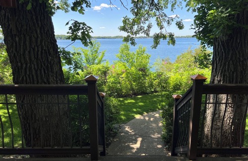 West Okoboji Maison | West Lake Okoboji lakefront cottage with private dock/hoist. Near Arnolds Park!
