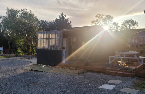 Porangahau Cabine | Whare Koa awaits to provide that relaxing ambience for you with all day sun!!