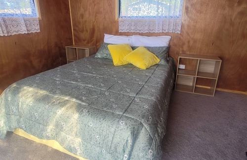 Porangahau Cabine | Whare Koa awaits to provide that relaxing ambience for you with all day sun!!