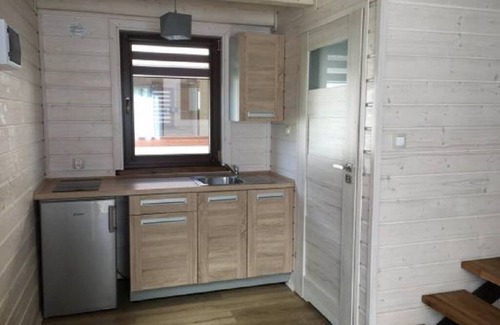 Mrzezyno Maison | White Holiday House est un complexe de 10 maisons de vacances en bois confortables