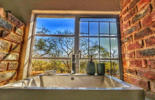 Nelspruit Cabine | White Rock suites indépendantes avec cuisine. Unité 1