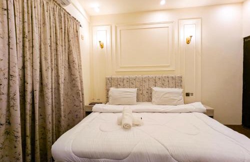 Gulshan-E-Jamal Lit Et Petit-Déjeuner | White Rose BNB - Airport Branch Karachi