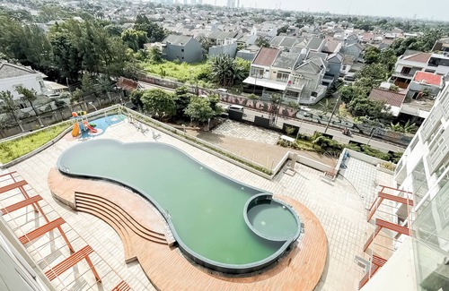 Serpong Appartement | White Tone Studio At Amazana Serpong Apartment