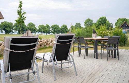Am Salzhaff Maison | Wiesenpieper - Ferienhaus mit Kamin, Sauna und Meerblick