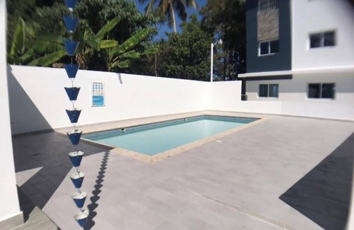 Moca Appartement | wifi, parking, Netflix, pool, ac, cable, terraza familiar.
