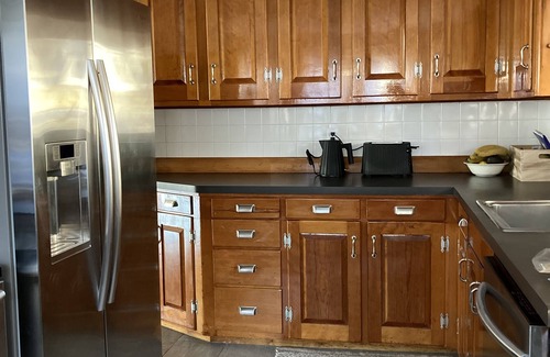 Prides Crossing Cottage | NEW -Lakefront 2 Bed / 3 bath + Extra Bed off of living room