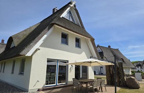 Am Salzhaff Maison | Wippezogel - Ferienhaus mit Sauna, Kamin und Meerblick
