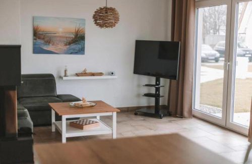 Am Salzhaff Maison | Wippezogel - Ferienhaus mit Sauna, Kamin und Meerblick