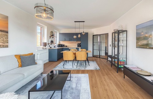 Zentrum Appartement | With a view of the Husum inland harbor, this stylishly furnished vacation apartment offers