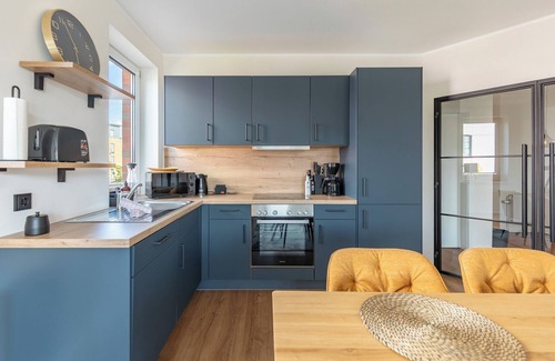 Zentrum Appartement | With a view of the Husum inland harbor, this stylishly furnished vacation apartment offers