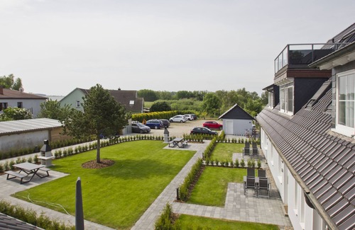 Gross Zicker Appartement | Vacation apartment with sea view and garden use - Haus Inselwind FeWo MEERstrand
