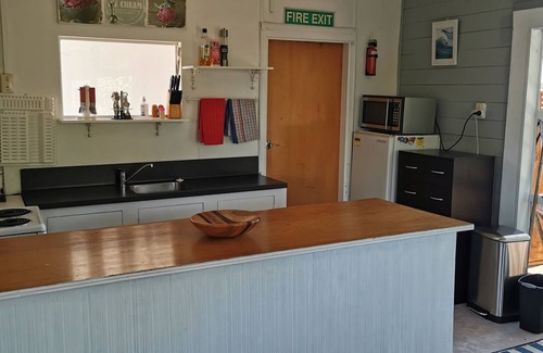 Opunake Cottage | With the lake on your doorstep, BEACH 2 minutes away and river swimming hole .