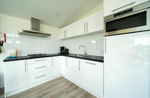 Municipality of Waalwijk Maison | Magnifique maison de vacances privée pour 4 personnes avec WIFI, piscine, TV et terrasse