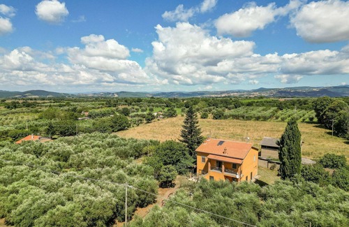 Pitigliano Maison | Belle maison de vacances privée avec climatisation, WIFI, TV, patio, animaux admis et parking