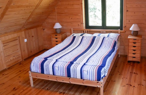 Czarny Mlyn Cottage | Gîte en bois à Czarny Mlyn avec jardin et barbecue