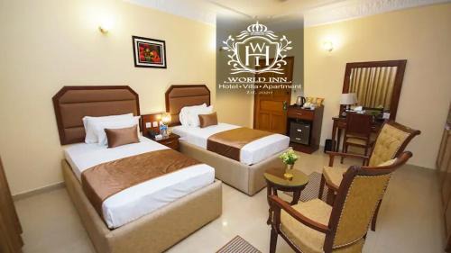D.H.A. Lit Et Petit-Déjeuner | World Inn by WI Hotel