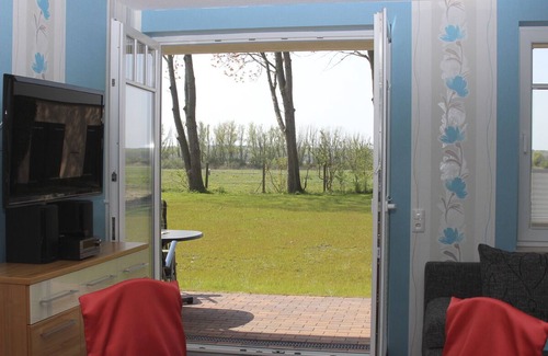 Borgerende Appartement | Wunderschöne Ferienwohnung mit Kamin, Fußbodenheizung und Blick in die Natur und nur 200 m bis zur Ostsee