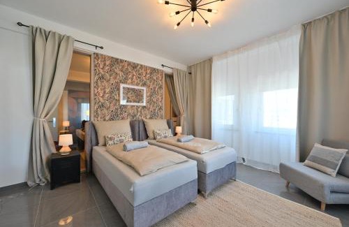 Nordstadt Appartement | Yello Homes - Luxus Loft für bis zu 7 Personen nähe Airport & Messe, Tischfußball & Whirlpool