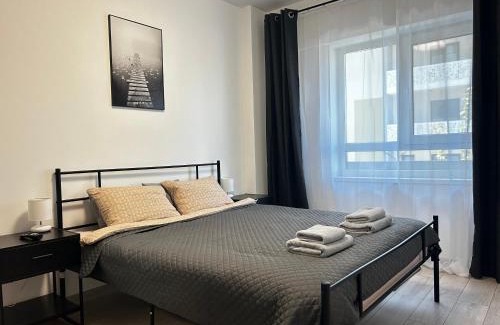 Nord-Est Appartement | Yellow Dawn Modern Flat in Quiet Area with Garage Parking and Self Check-In