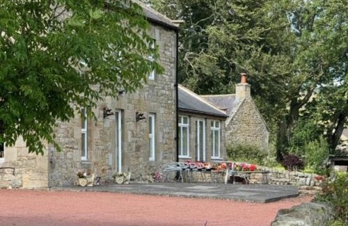 West Woodburn Maison | Yellow House