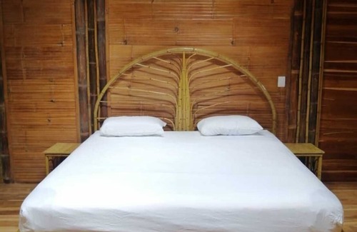 Ballena Cabine | Yogachal Vista Mar bamboo cabiña in jungle w waterfall and seaview yoga deck