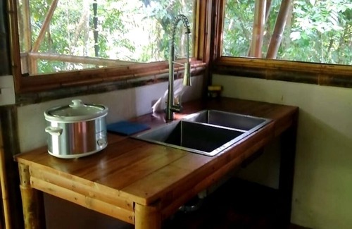 Ballena Cabine | Yogachal Vista Mar bamboo cabiña in jungle w waterfall and seaview yoga deck