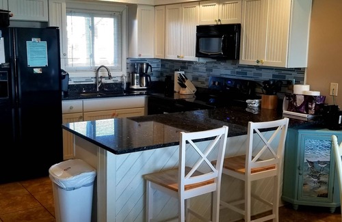 Rodanthe Copropriété | Vous allez adorer Sea Glass. Condo semi-bord de mer. À quelques pas de la plage. Draps gratuits