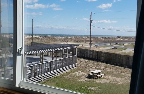 Rodanthe Copropriété | Vous allez adorer Sea Glass. Condo semi-bord de mer. À quelques pas de la plage. Draps gratuits