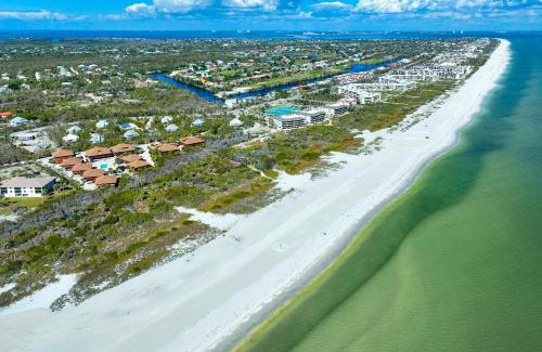 Sanibel Maison | Your Island Escape - Spacious Retreat with Wrap-Around Lanai and Private Beach