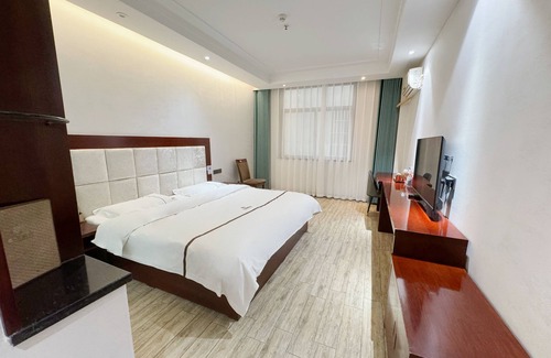 Qindu Qu Lit Et Petit-Déjeuner | Yundu Business Hotel
