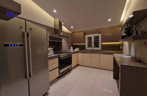 PECHS Villa | Zaha Home: Akhter Villa-2br Top portion,Jheel Park