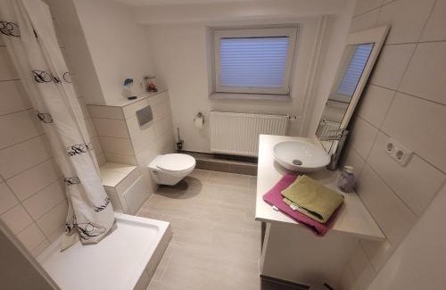 Garßen Maison | Zimmer im Souterrain mit eigenem Bad