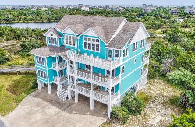 1-acre waterfront oasis with pool, hot tubs & sunrise/set views - dog-friendly