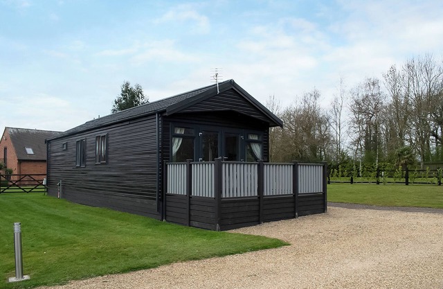 Comfortable two bedroomed lodge styled holiday home with one large king and two large singles.
