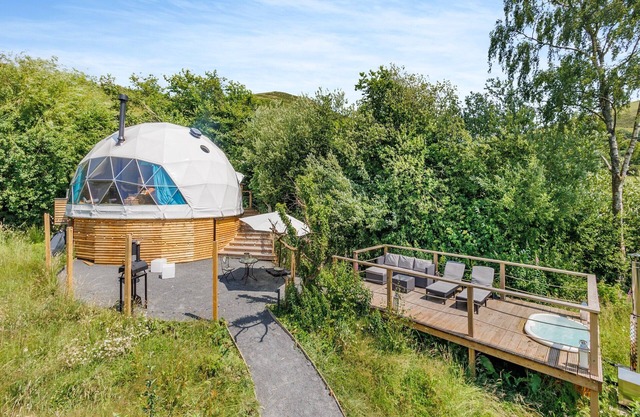 A spacious glamping dome in rural Wales, sleeping two guests in complete luxury.