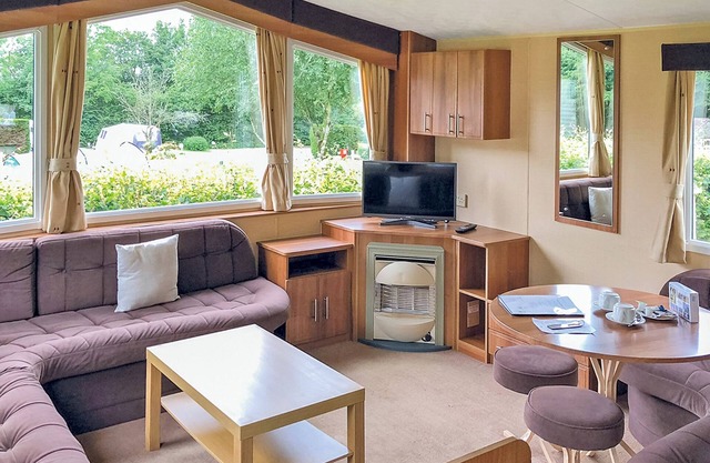 Luxury, modern and spacious 12ft-wide family caravan with one double and two twin.