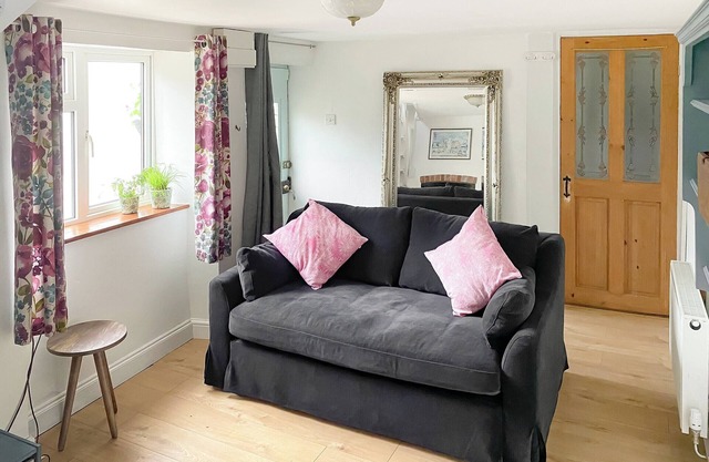 In this idyllic setting, the one-bedroom cottage in Combe St.