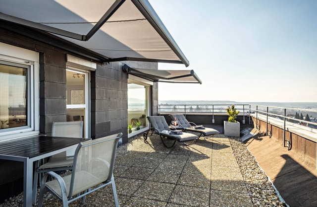 Appartement "Chilli Home" avec vue sur le lac, terrasse privée et Wi-Fi.