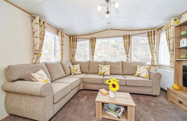 12ft-wide caravan with one double and two twin.