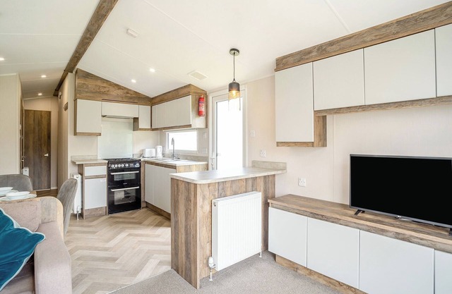 12ft-wide luxury caravan with one double and two twin.